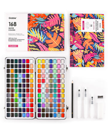 A watercolor paint set by Grabie displayed open with a variety of colors, alongside a coloring book with pre-made lineworks, a water brush, a drawing pencil, and a sharpener. The set is packaged in a box with a vibrant, colorful design.