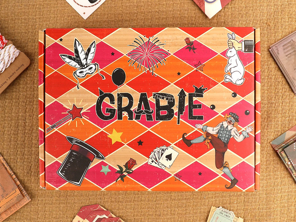 Colorful arts and crafts box with circus, magic, and card-themed illustrations on lid