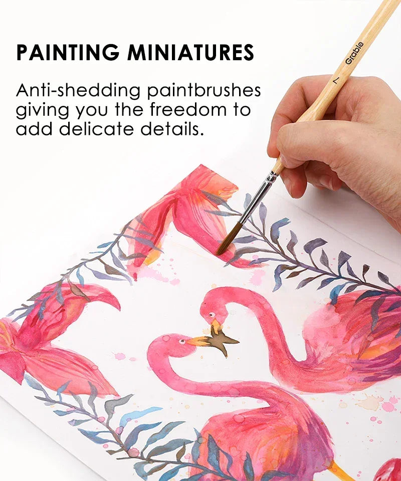 Hand painting detailed watercolor flamingos using the 11 Pcs Miniature Detail Paint Brush Set With Natural Wood Handle