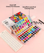 Watercolor Travel Set of 100 With Brush featuring vibrant colors, carrying case, water brushes, and color chart on a pink background