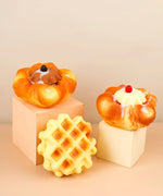 Feel-Good Stress Relief Foam Squishy - Chocolate Flower Bread with waffle and cream toppings on pastel blocks