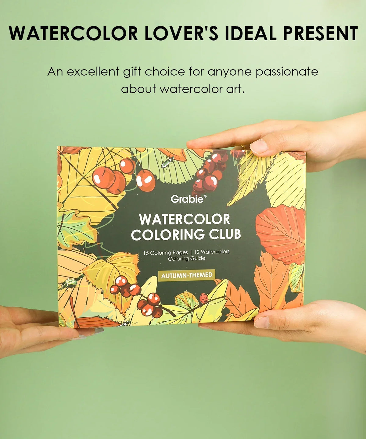 Hands holding Autumn-Themed Watercolor Coloring Club Box featuring fall leaves and berries art supplies packaging