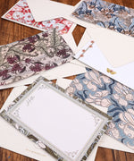 6 Pack Postcards With 6 Matching Envelopes featuring intricate floral and abstract designs on wooden background