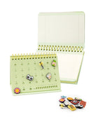 2-IN-1 POPIN Notebook in light green with spiral binding and decorative pins arranged on the cover and beside it