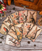 20 Sheets Grabie Exclusive Silent Woodland Paper Set with vintage animal and floral watercolor designs on rustic wood background