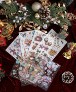 8 Sheets Grabie Exclusive New Year Sticker Set with festive holiday designs on a dark red background with pine cones and ornaments
