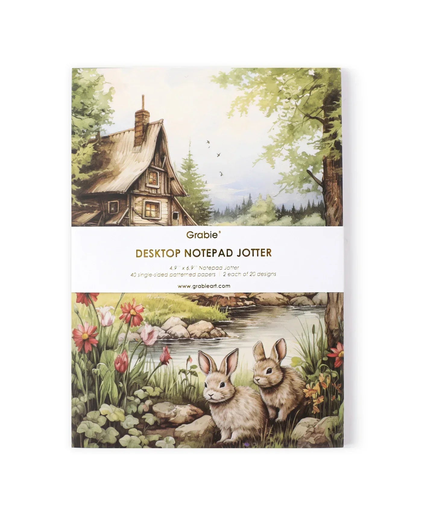 Grabie Exclusive Desktop Notepad Jotter featuring a scenic cabin, forest, river, and two rabbits illustration.