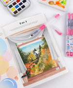 Open Let Your Feelings Flow 30-Day Workbook showing Day 3 watercolor painting near art supplies and brush pen.