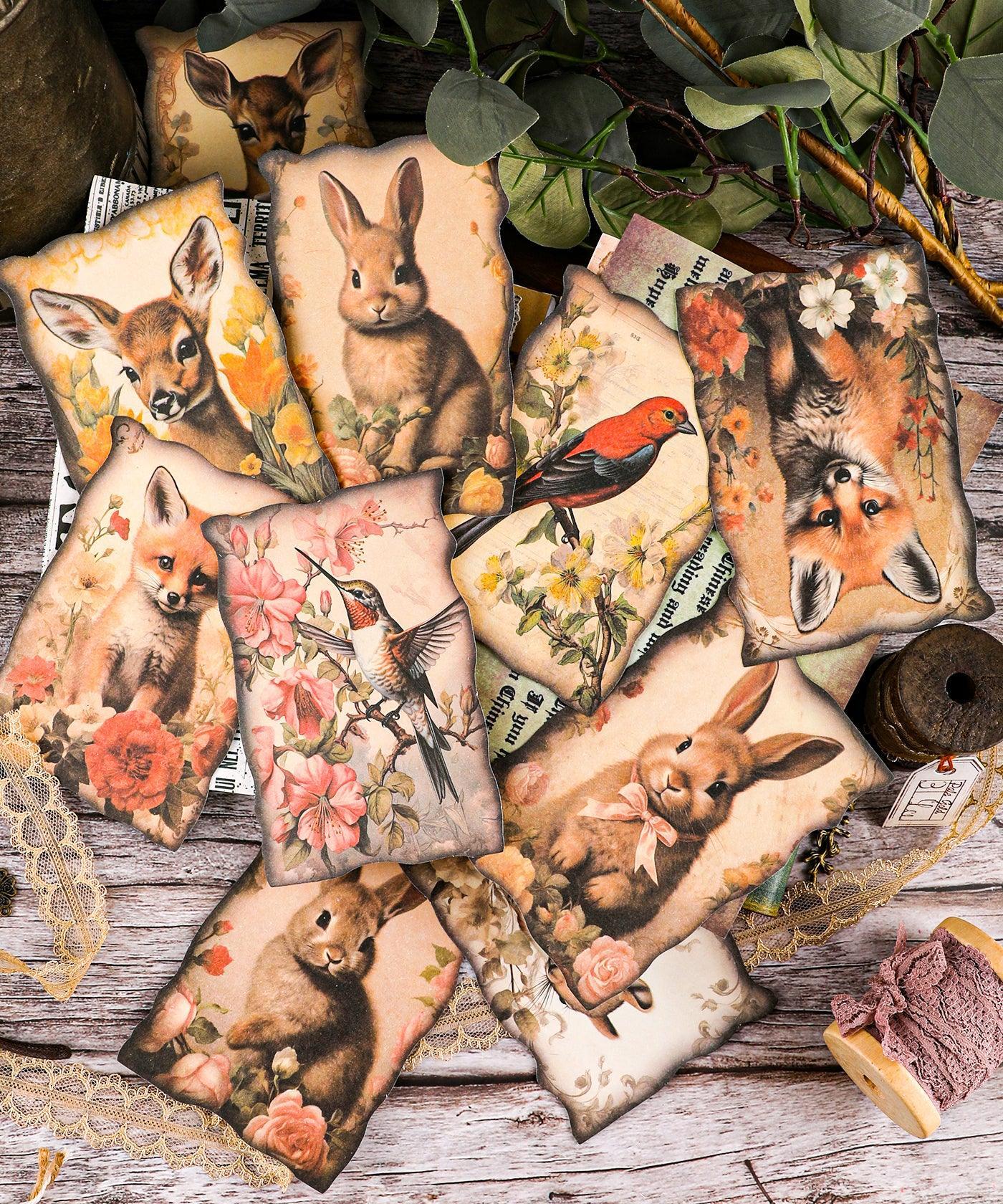 20 Sheets Grabie Exclusive Silent Woodland Paper Set with vintage-style animal and floral illustrations for scrapbooking and art projects