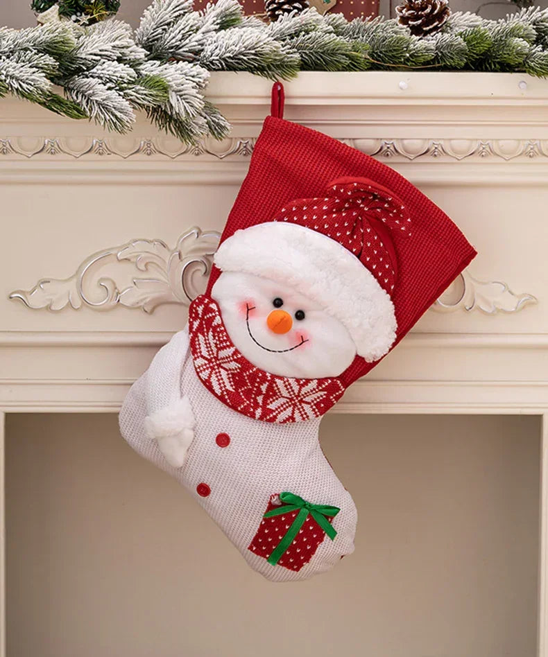 2 Pcs Large Size Christmas Stockings For Gift featuring a smiling snowman with a red hat and scarf hanging on a decorated mantle