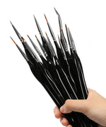 Hand holding 15 Pcs Miniature Detail Brush Set with fine tips for watercolor and detailed art supplies.