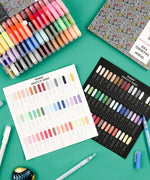 Extra Fine Tip Acrylic Paint Marker Set of 48 with colorful markers and swatch sheets for detailed art and scrapbook projects