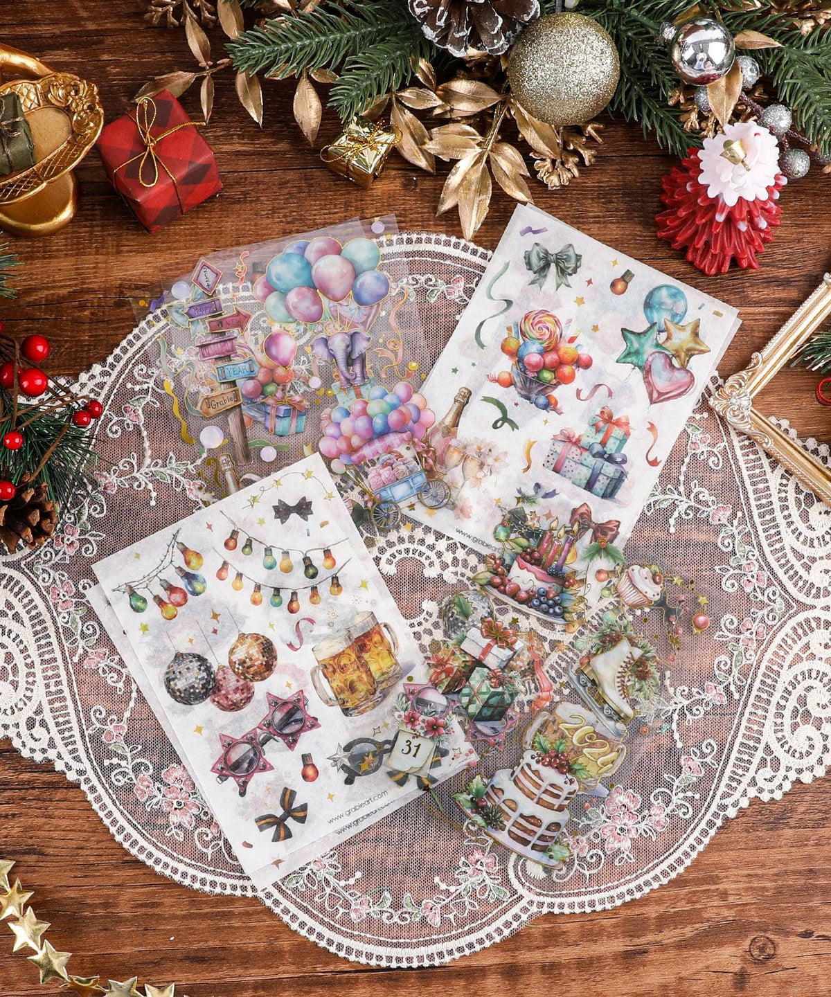8 Sheets Grabie Exclusive New Year Sticker Set featuring festive balloons, gifts, cakes, and holiday decorations on lace background