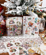 8 Sheets Grabie Exclusive New Year Sticker Set with festive designs for scrapbook and art supplies under a snowy Christmas tree