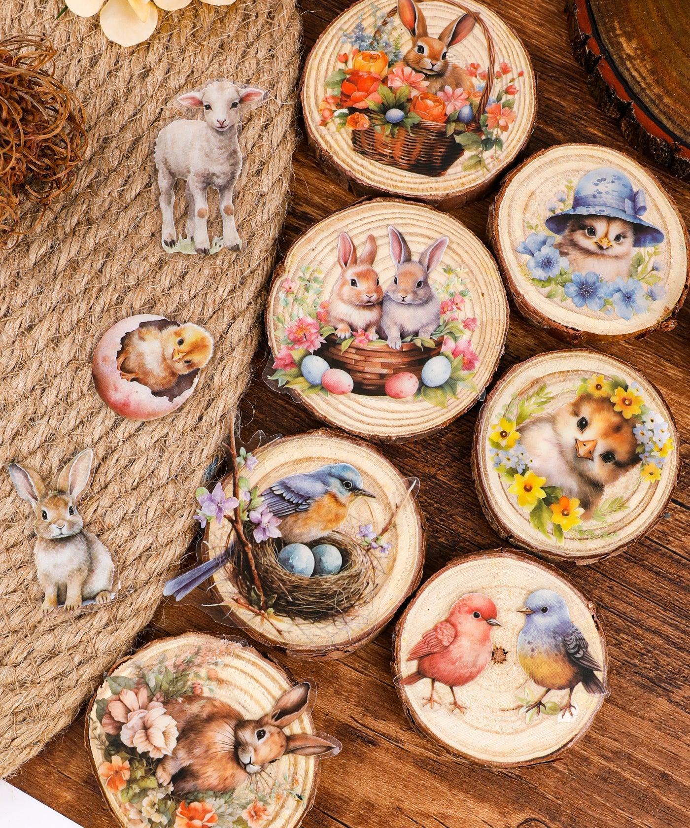 60 Pcs Grabie Exclusive The Magic Of Easter Sticker Set with bunnies, chicks, birds, and spring floral designs on wood textures