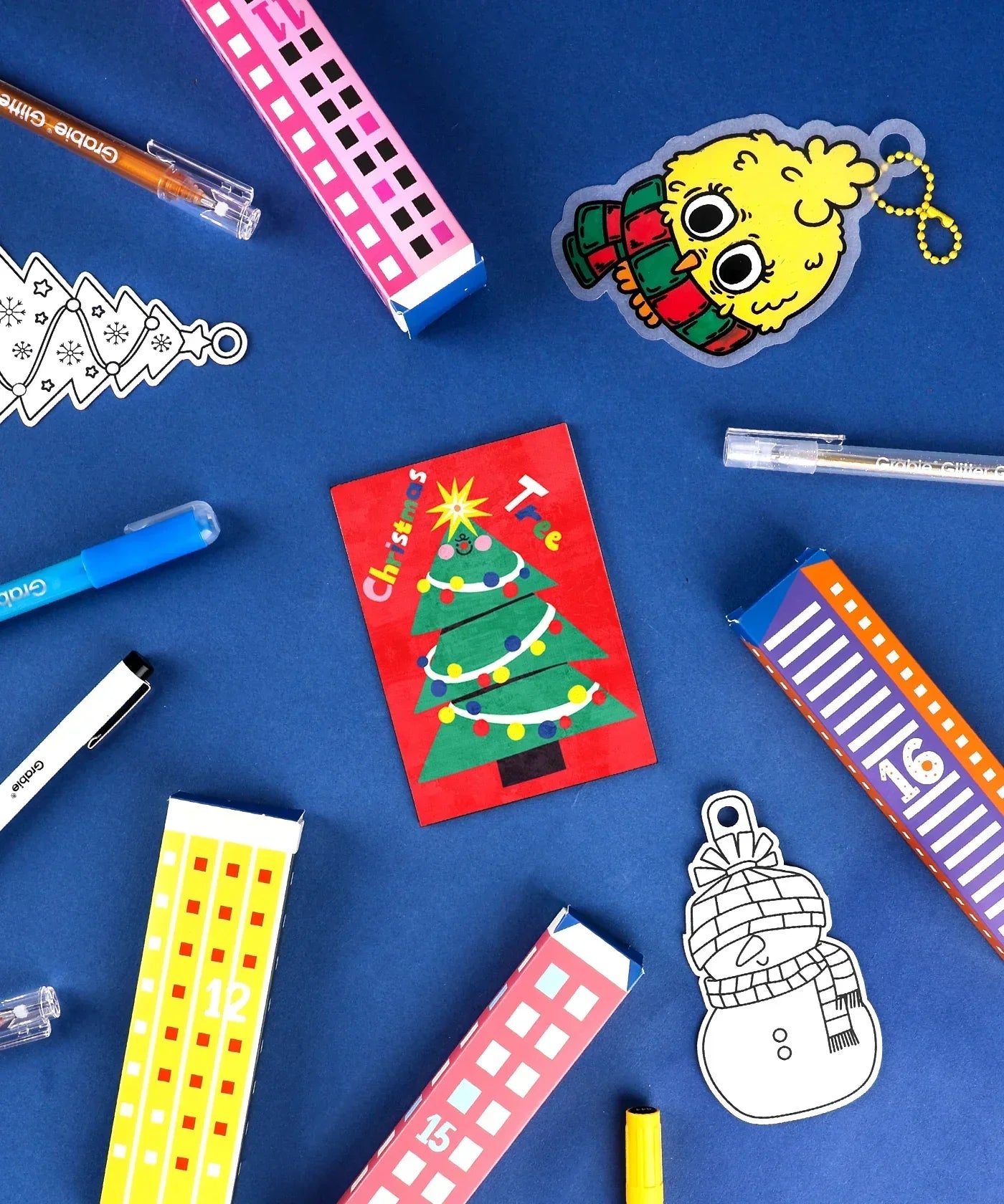 2025 Limited Edition Holiday Advent Calendar with colorful numbered boxes, markers, and festive holiday-themed drawings