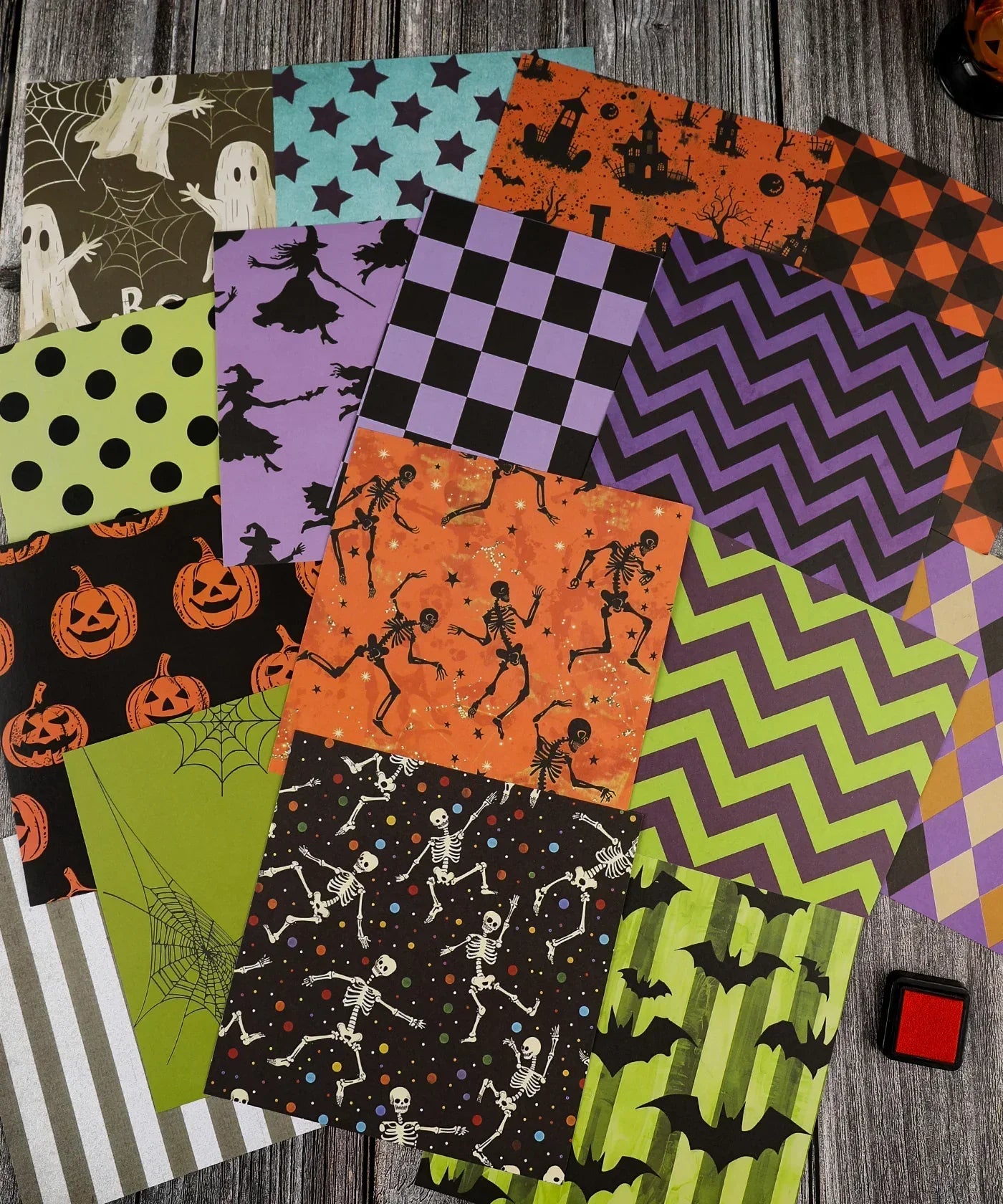 16 Sheets Grabie Exclusive Halloween Party Paper Set with colorful spooky patterns for scrapbooking and craft projects