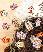 20 Pcs Grabie Exclusive Fairybird House Sticker Set with colorful birdhouse designs displayed on a wooden surface and nest