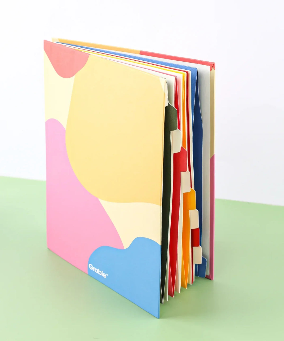 Grabie Sort It Out Accordion File Folder with colorful expandable sections for organizing art supplies and craft materials.