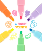 Six fruit scented markers arranged in a circle with cute fruit icons representing strawberry, orange, pineapple, lime, blueberry, and grape.