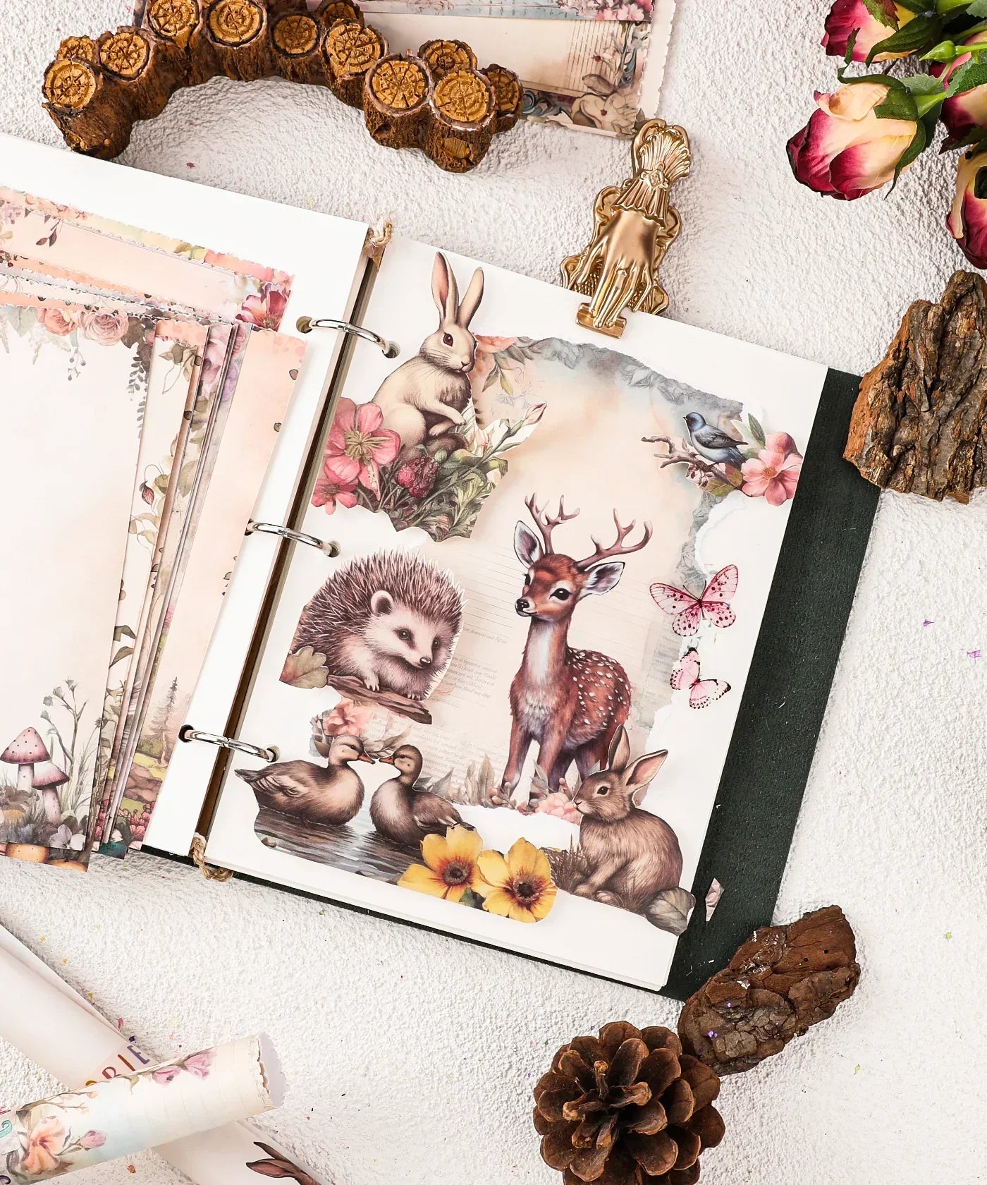 Grabie Exclusive Desktop Notepad Jotter open showing wildlife illustrations with floral and nature-themed decorations.
