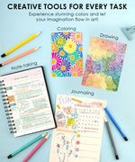 Creative tools spread on blue surface showing notes, colorful drawings, and journaling with Medium Point Erasable Gel Pen Set