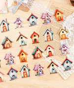 20 Pcs Grabie Exclusive Fairybird House Sticker Set arranged on a wooden surface with paper and lace accents