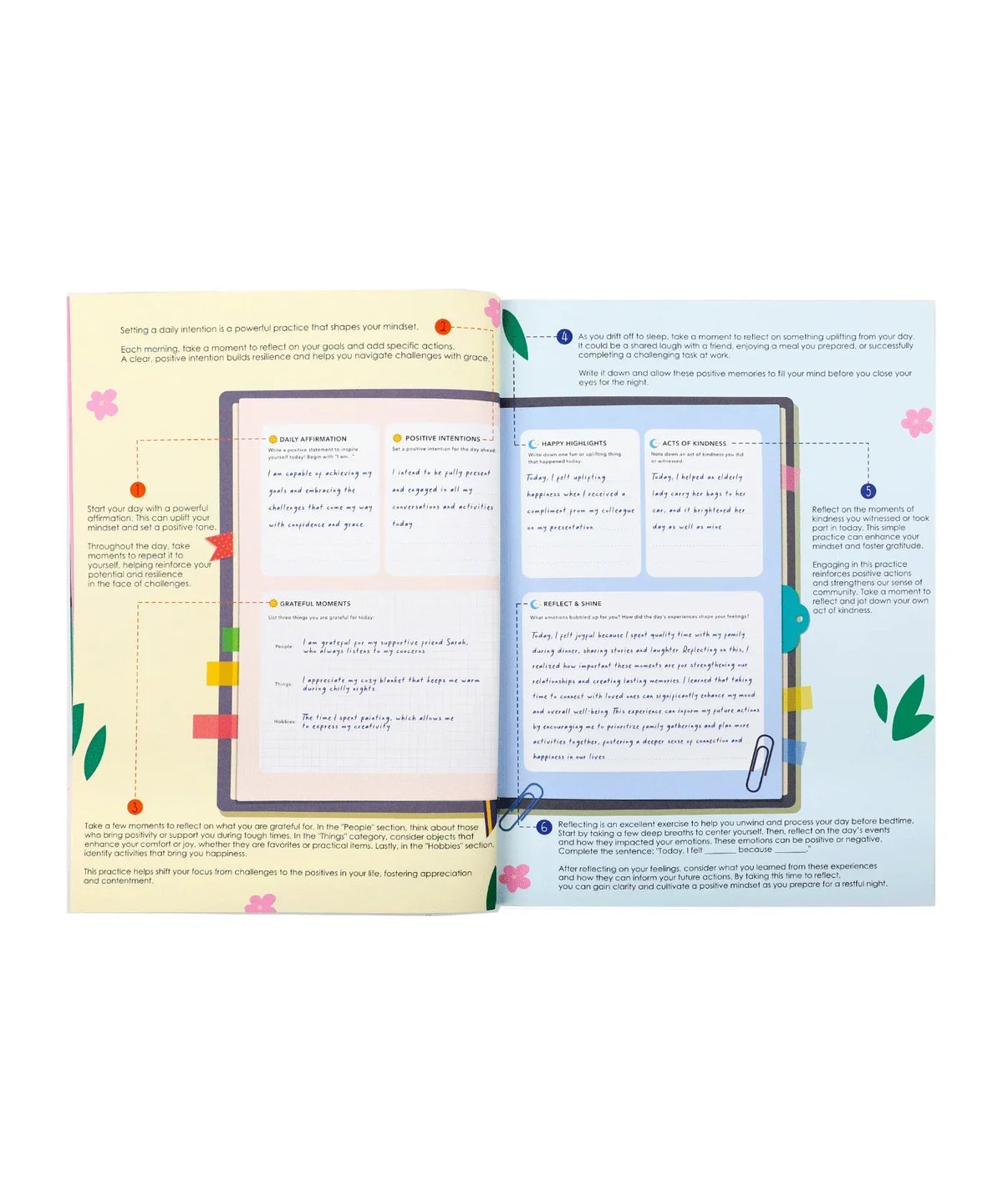 Open pages of Affirm Your World 4-Week Workbook showing daily reflections and gratitude prompts with colorful tabs.