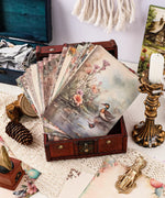 Grabie Exclusive Desktop Notepad Jotter with floral and duck designs displayed in a vintage wooden box on lace tablecloth