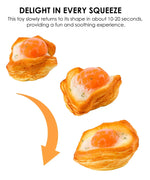 Feel-Good Stress Relief Foam Squishy - Fried Egg Bun shown in stages of being squeezed and returning to shape.