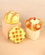 Set of three squishy foam desserts including the Feel-Good Stress Relief Foam Squishy - Waffle Sandwich toy