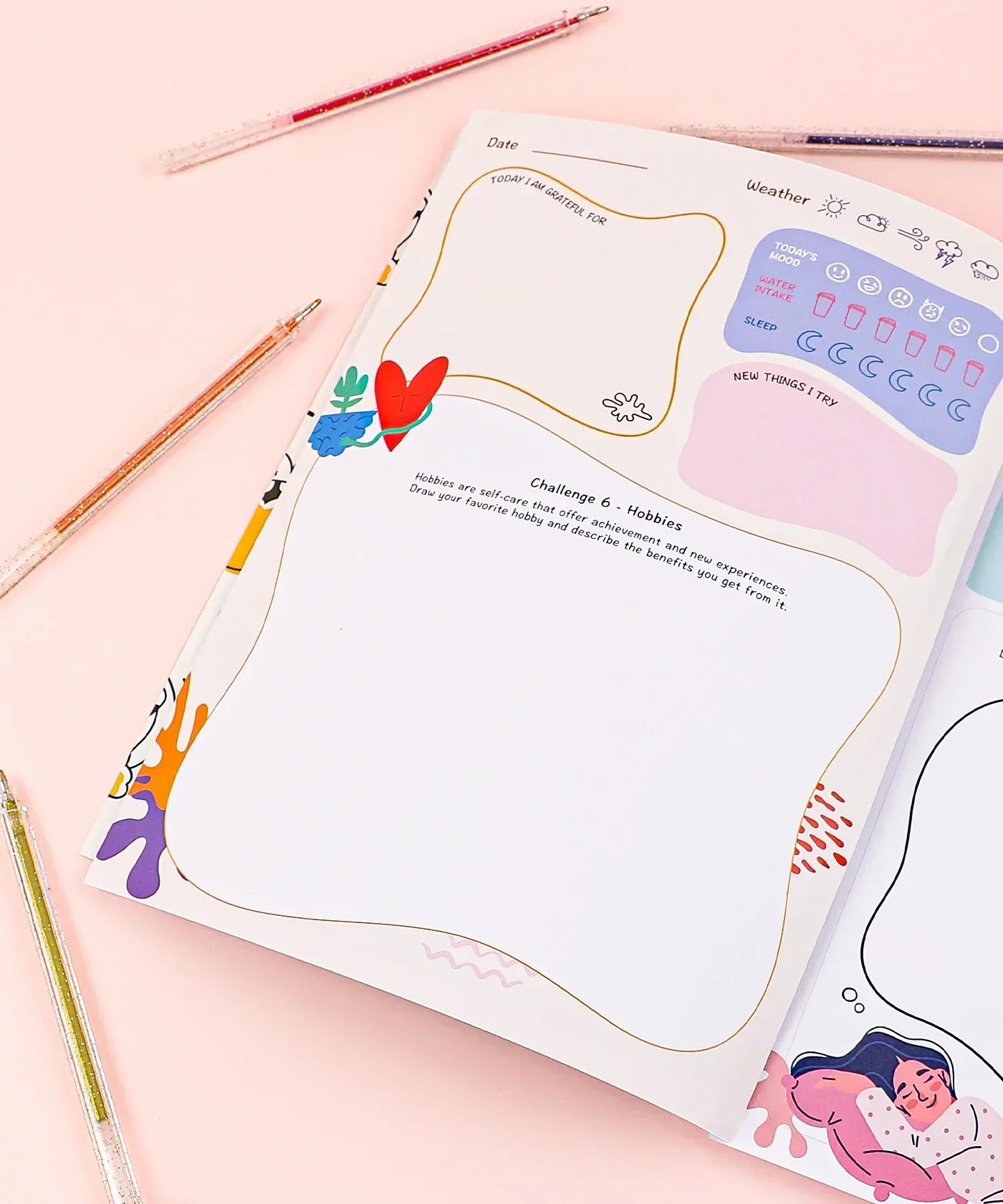 Open page of Be You And Love You 28-day Workbook with colorful pens and creative layout for hobbies and weather tracking