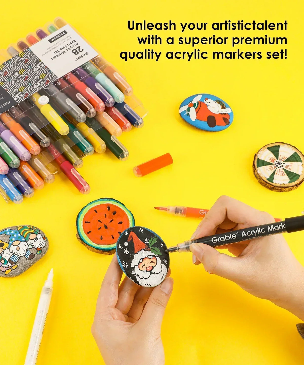 Extra Fine Tip Acrylic Paint Marker Set of 28 used to paint detailed colorful designs on stones and craft projects
