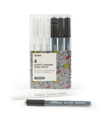 Extra Fine Tip Acrylic Paint Marker Set Of 6 displayed in a clear plastic case with black and white marker pens visible