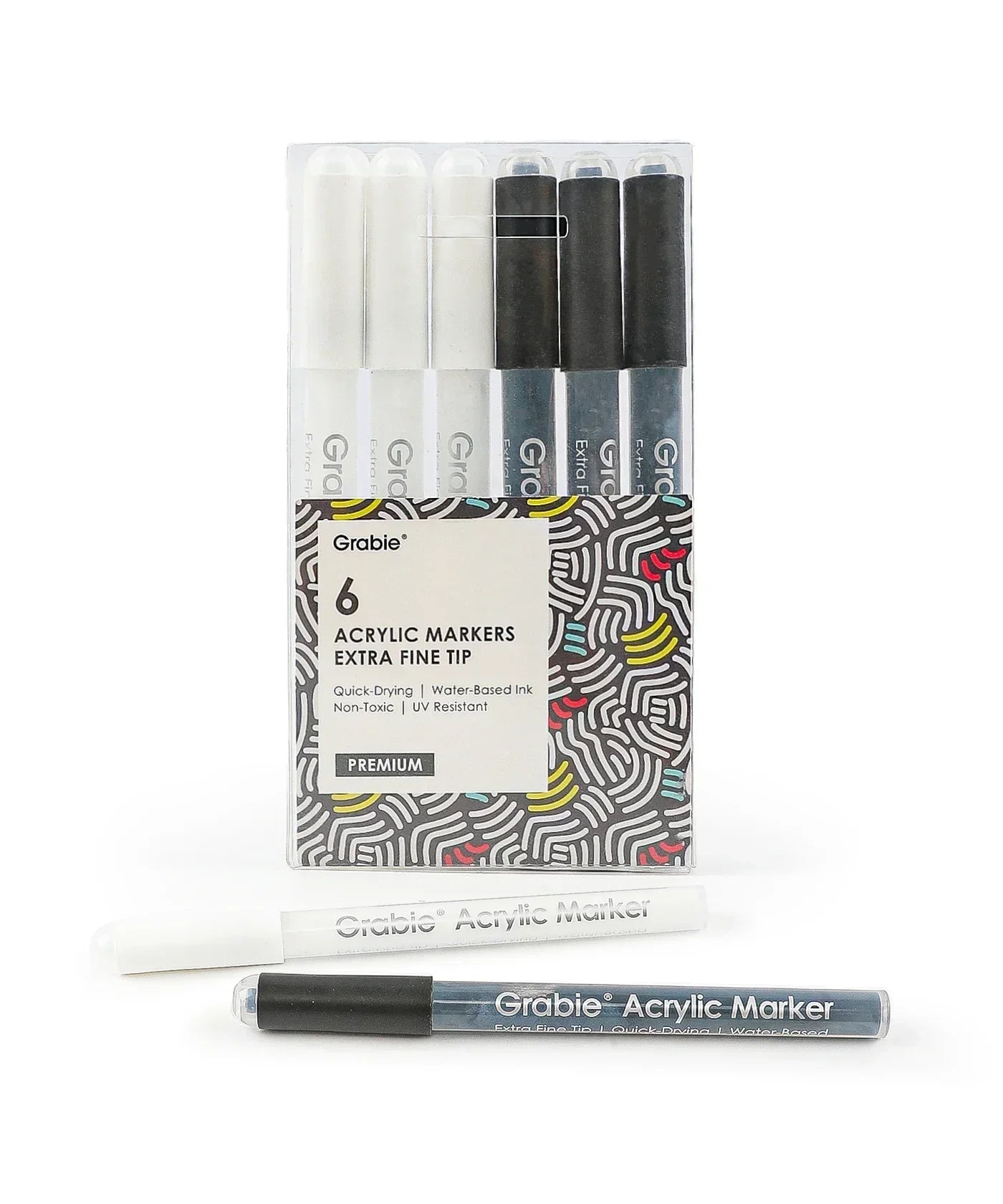 Extra Fine Tip Acrylic Paint Marker Set Of 6 displayed in a clear plastic case with black and white marker pens visible