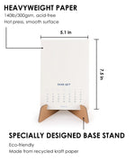 12-Month Watercolor Calendar Set For 2026 displayed on eco-friendly recycled kraft paper stand with heavyweight smooth paper pages