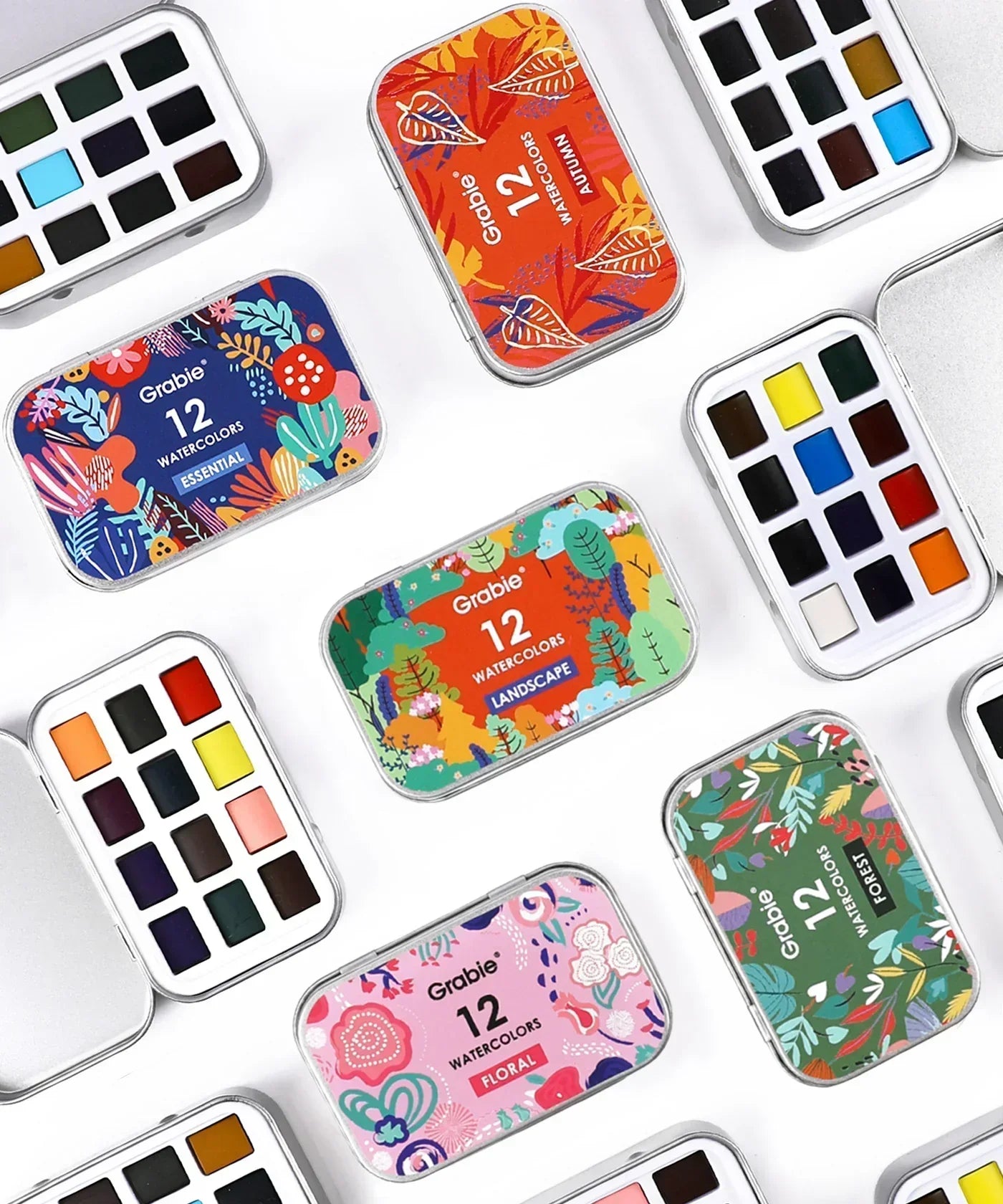Colorful watercolor sets with 12 pans each, arranged for the Watercolor Pocket Set - 5 Themes Value Bundle by Grabie.