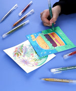 Jumbo Iridescent Glitter Gel Ink Pen Set With Bold & Bright Coloring Essential Kit used to create colorful art and designs on paper.