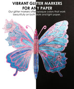 Iridescent Glitter Acrylic Paint Marker Set with vibrant pink and blue glitter butterfly art on black and white paper background