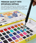 Hand dipping brush into vibrant watercolor palette in 2026 Watercolor Calendar & Creative Tools Set for smooth artistic flow