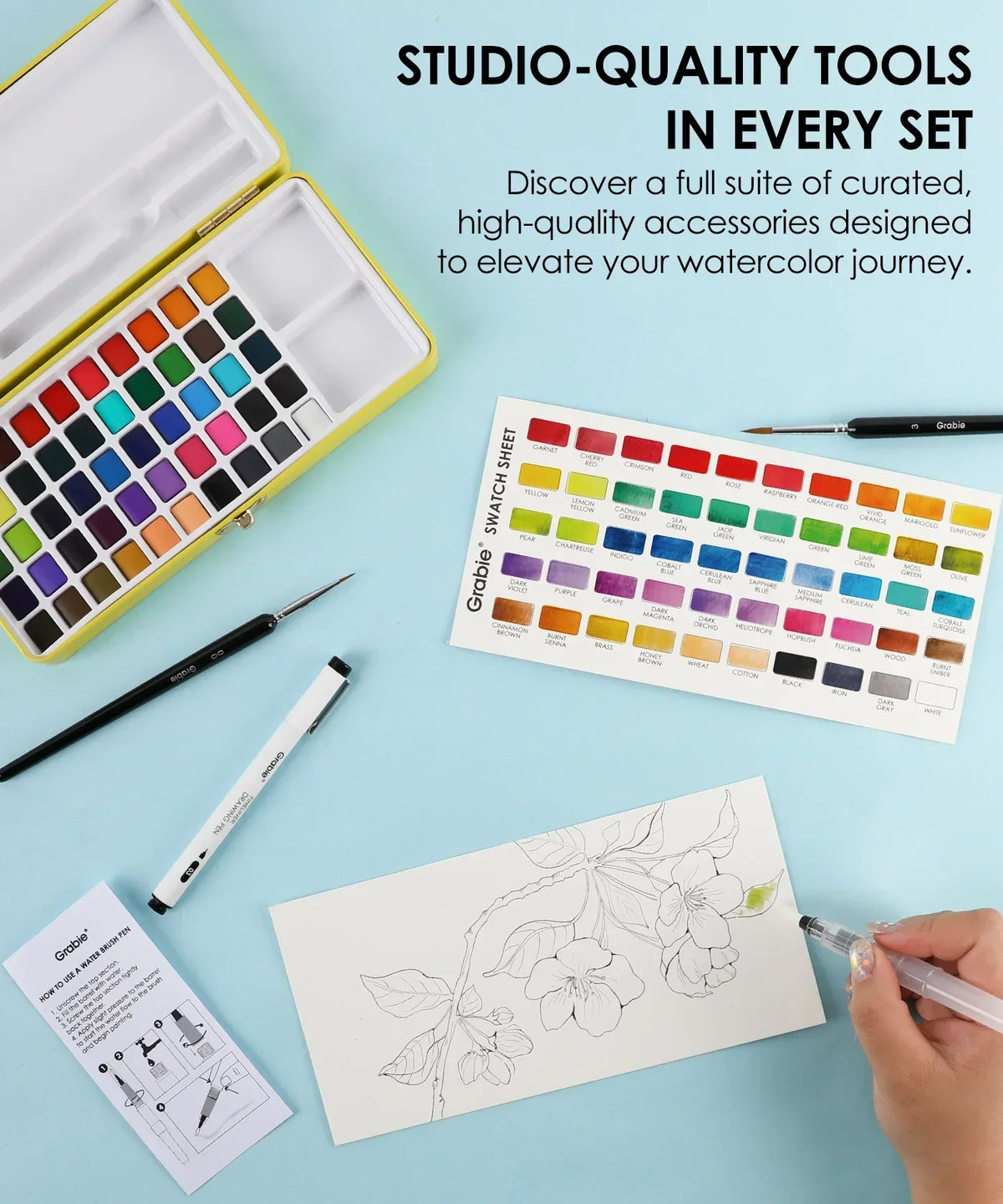 Watercolor Set Of 50 & Coloring Book Bundle showing open watercolor palette, color swatch, paintbrushes, and floral sketch being painted.