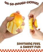 Hands stretching and squeezing the Grabie Ultimate Stress Relief Squishy with a soft, dough-like texture