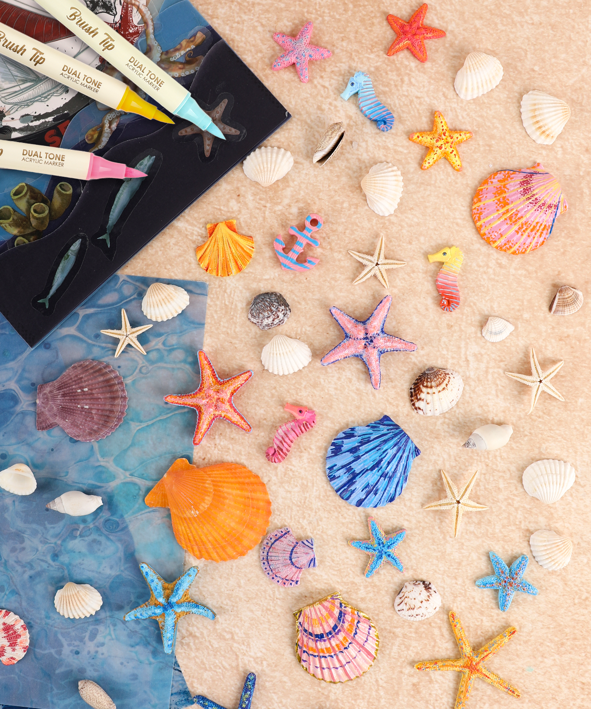 Magnet Painting Kit (DIY Refrigerator Magnet Kit) with painted sea shells, starfish, seahorses, and art supplies on table 