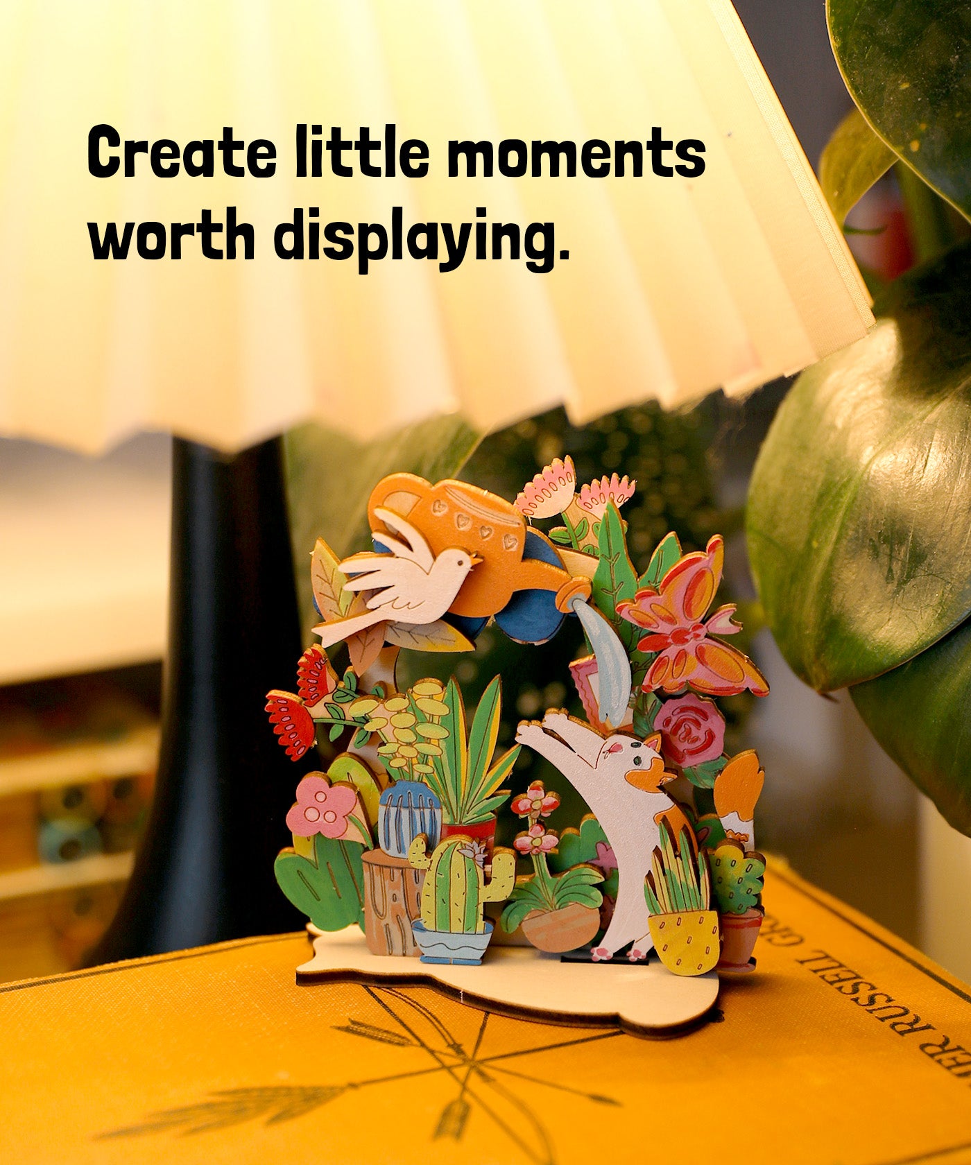Completed wooden painting craft displayed on shelf