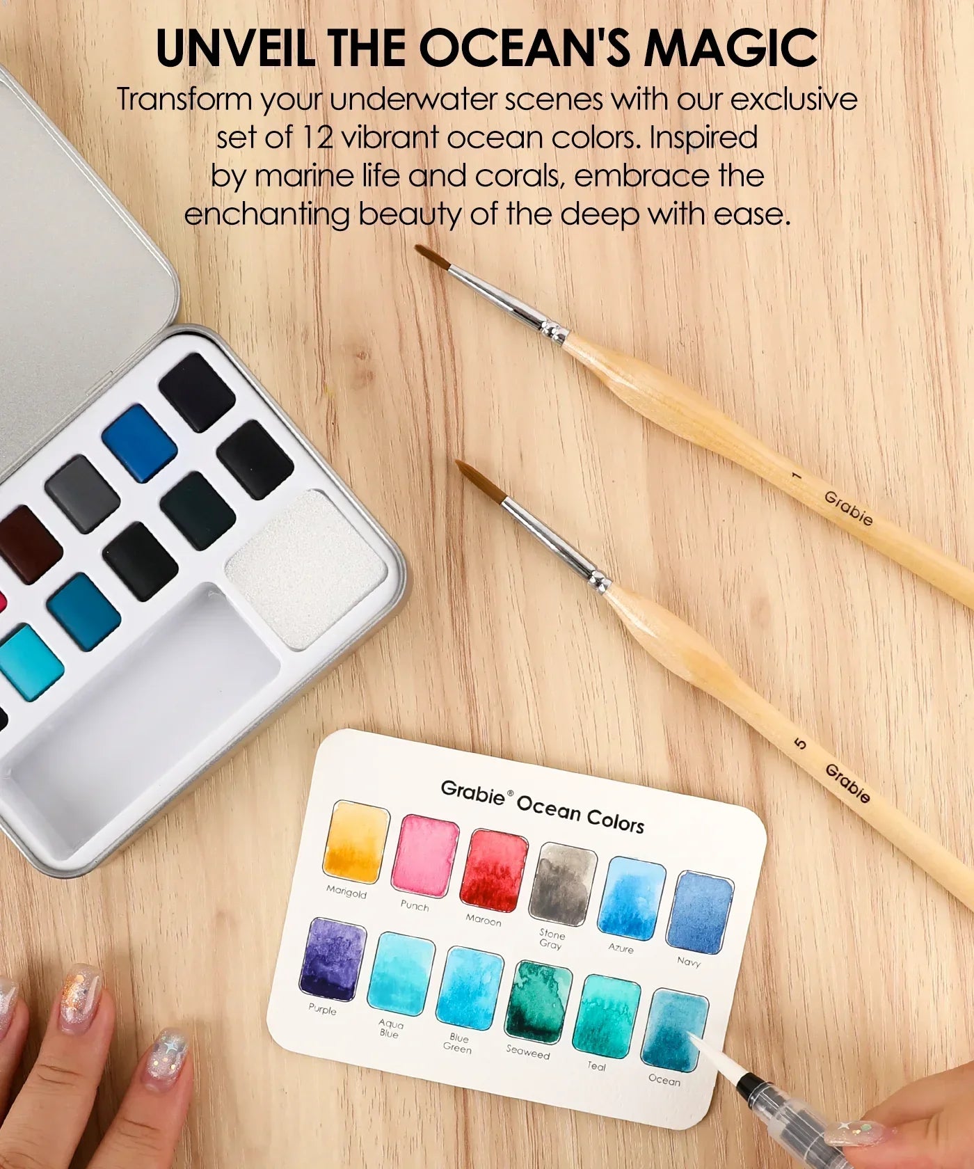 Watercolor Pocket Set Of 12 With Brush - Ocean Colors with vibrant paint swatches and two fine art brushes on wood background