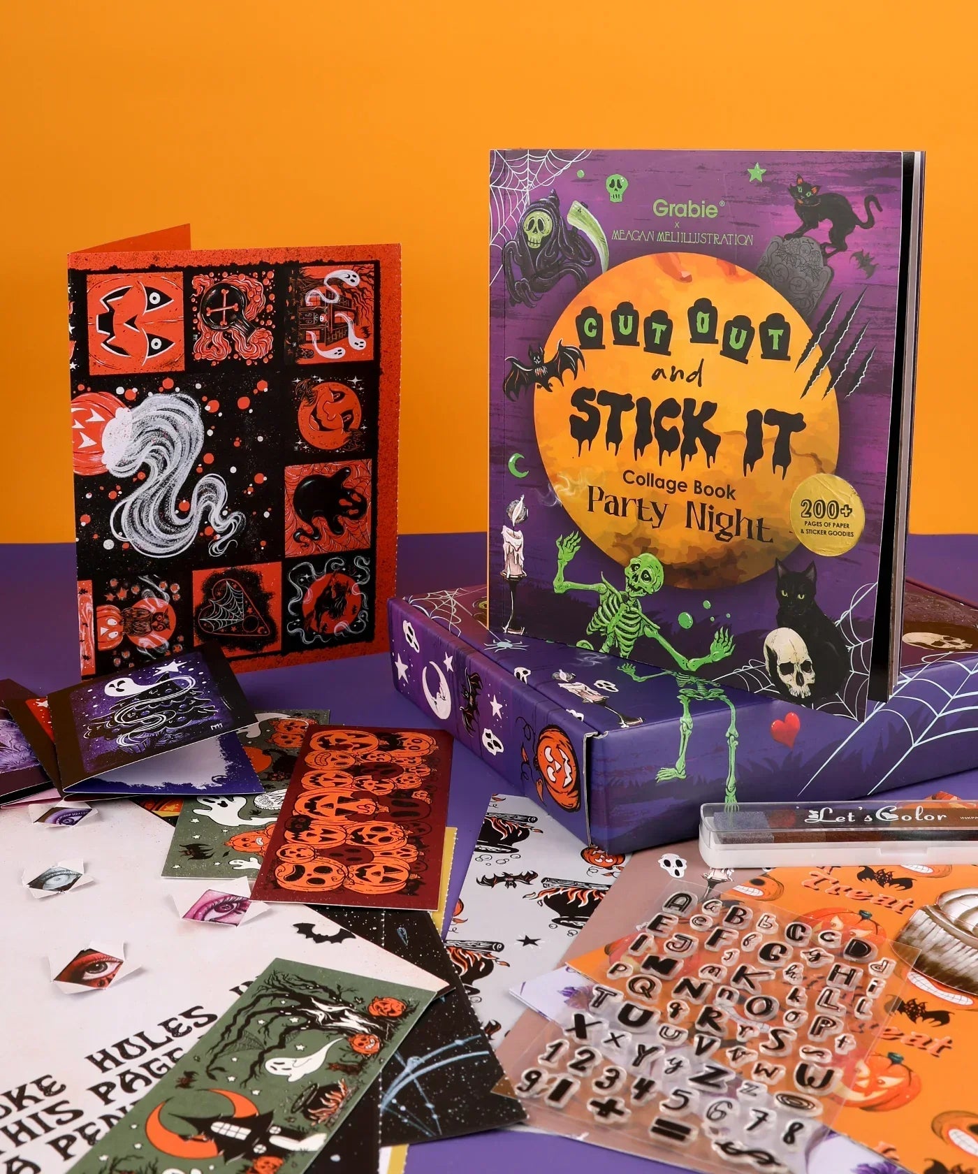 200+ Pages Halloween Party Night Collage Activity Book with spooky stickers and colorful Halloween art supplies displayed