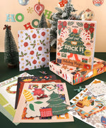 200+ Pages Holiday Magic Collage Activity Book with festive cutouts and holiday-themed art supplies for creative collage projects