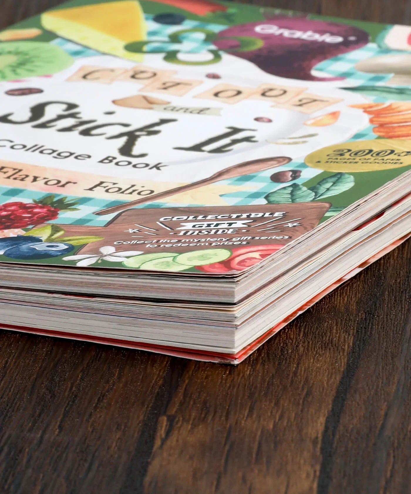 Close-up of colorful pages from The Flavor Folio-Themed Grabie Scrapbook Club Box featuring artistic collage designs.