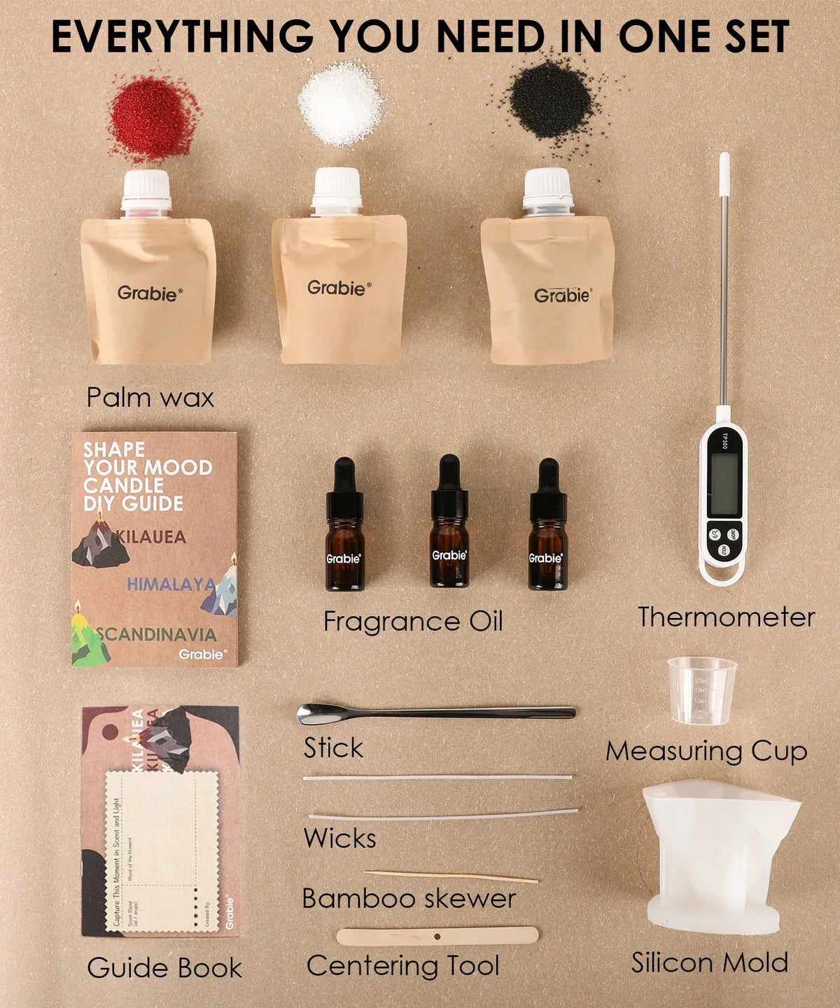 Scent Candle DIY Set with palm wax, fragrance oils, thermometer, wicks, mold, tools, and guide book laid out on a table