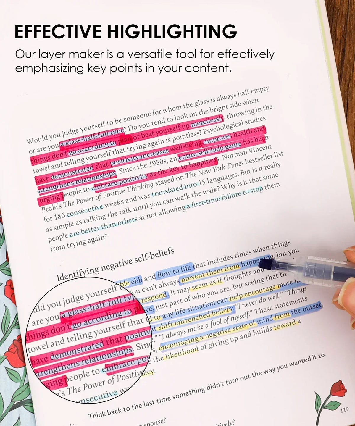 Hand highlighting text in a book using Color Magic Layering Marker Set for Wholesale showcasing vibrant pink, blue, and yellow colors.